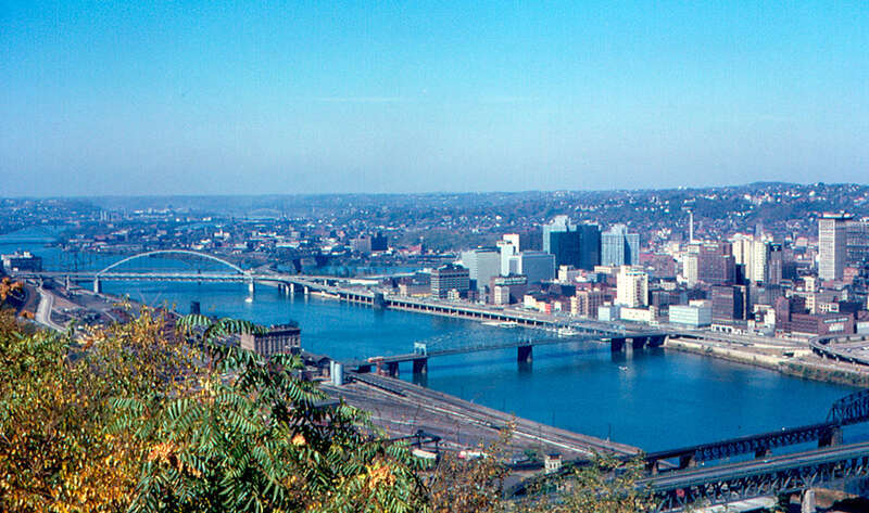The &quot;Golden Triangle&quot; in Pittsburgh, where the Monongahela (foreground) and Allegheny Rivers meet to form the Ohio River (left).  The viewpoint is Mount Washington, on the south bank of the Monongahela River in 1963.  This photo is geotagged.