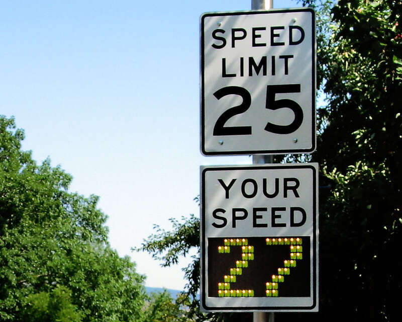 Close-up of a radar-based speed feedback sign, with the recorded speed over the limit. Northbound sign on 9th Street, Boulder, Colorado, United States. Near the junction with Cascade Avenue.
