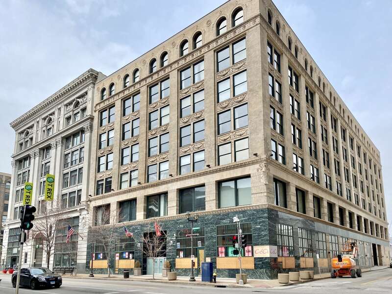 Lammert Building (Eames and Young, 1898) and Bankers Lofts (Shepley, Rutan and Coolidge, 1892) visible in the background.  The buildings are contributing structures in the Washington Avenue East of Tucker Historic District, listed on the National