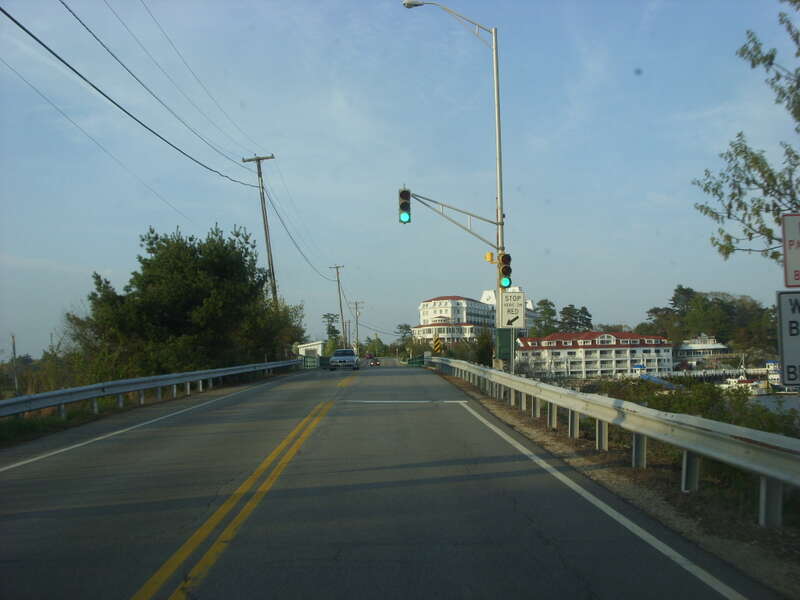 Approaching the Little Harbor Bridge is a 1942 bascule bridge carrying New Hampshire State Route 1B (and Wentworth Road) over Little Harbor, in Rye and New Castle, New Hampshire. The traffic light is for drawbridge openings.