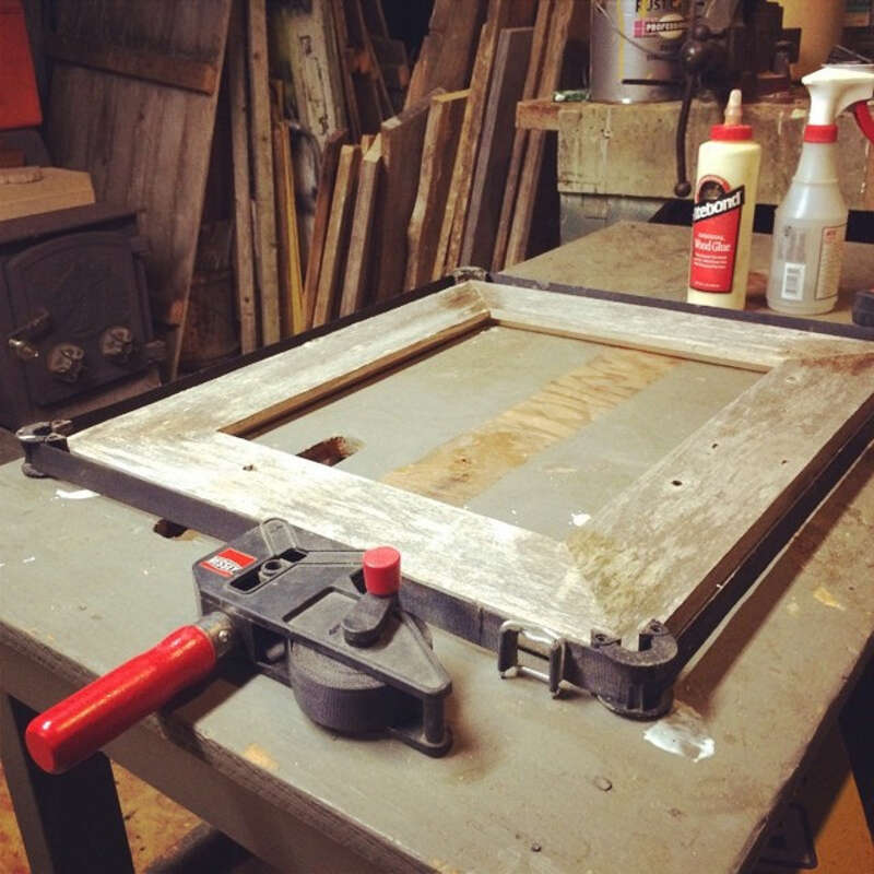 A band clamp used to clamp a picture frame.