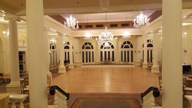 This room still has the original sconces and the center chandelier in the early 1900s.