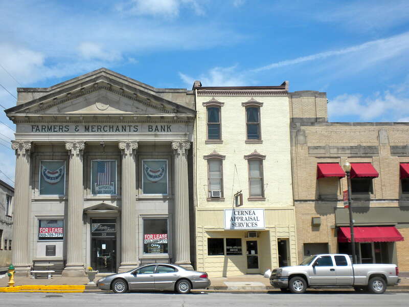 Broadway District	 in Hannibal, Missouri, on the NRHP since August 1, 1986.  The Historic District is roughly bounded by S. Main, Broadway, and S. Third Sts. in Hannibal.  These particular buildings are on the north side of Broadway, a block west of