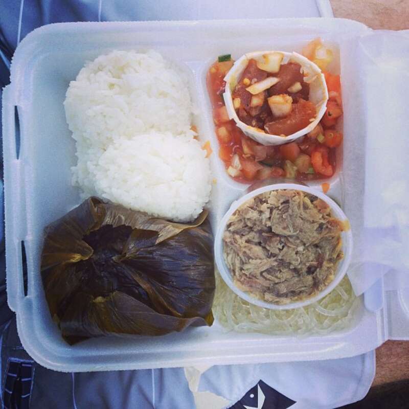Hawaiian plate lunch: lau-lau, Kalua pork, lomi-lomi salmon, rice, noodles.