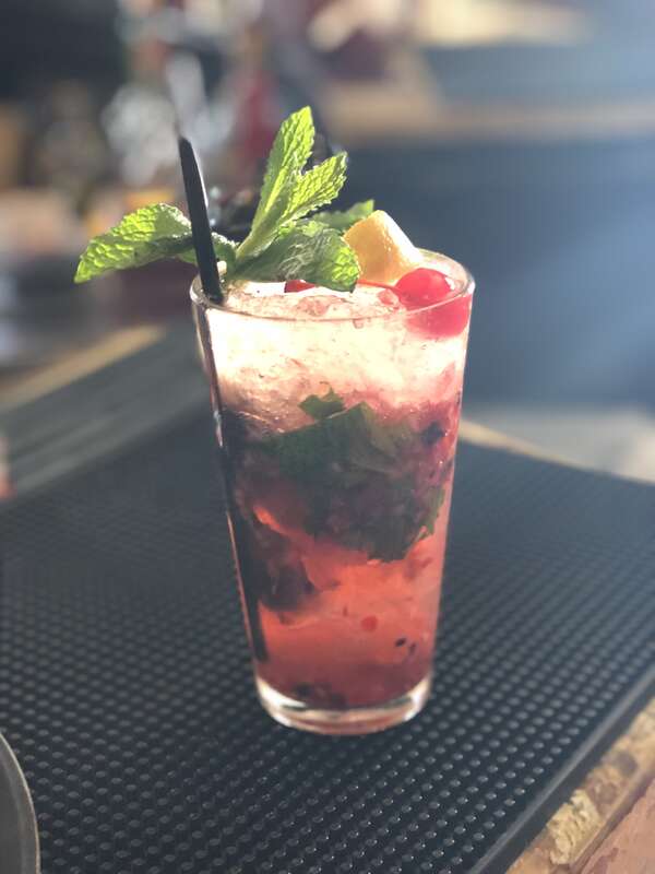 The Jingle Bell Julep (a Mint Julep made with raspberry, strawberry infusion/maceration) at the Round Robin Bar in Washington, DC.