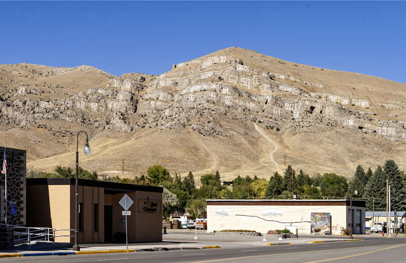 Numbers Hill above Arco, Idaho from Grand Avenue. This hill is painted with the graduating class years of Butte County High School.