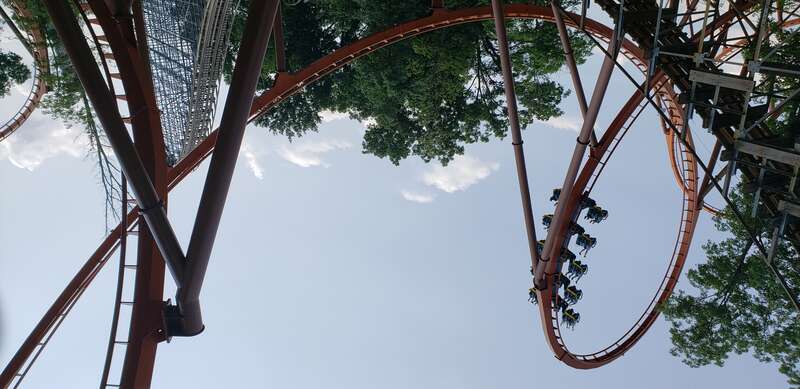 Thunderbird Orange Bolliger and Mabillard Wing Coaster with Hybrid Wood Coaster, Voyage, manufactured by Gravity Group.