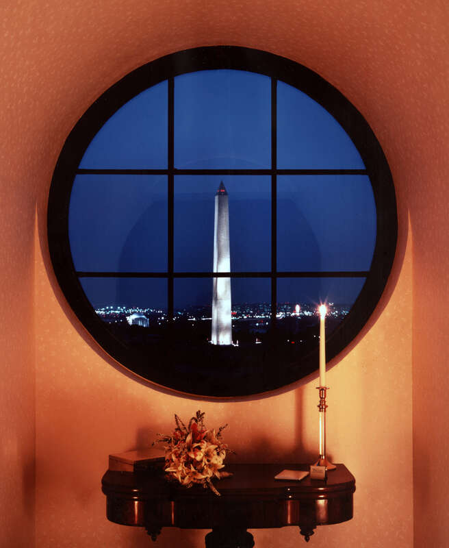 The Washington Monument as seen through a bull's eye window at the Willard InterContinental Hotel in Washington, D.C