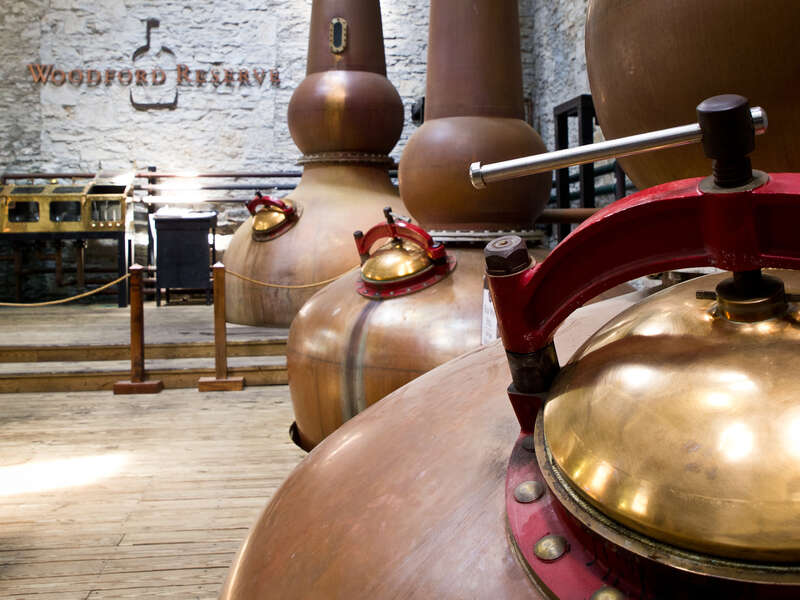 The Still Room, where copper stills are used to separate alcohol from the mash, in a process known as distillation.Photo taken with an Olympus E-5 at the Woodford Reserve distillery, Versailles, Kentucky, USA.Cropping and post-processing performed
