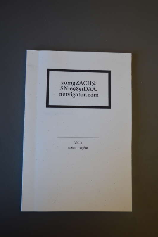 A white book with the title &quot;zomgZACH@SN-69891DAA.netvigator.com&quot;, and a subtitle &quot;Vol 1: 2/10—3/10&quot;. It is a piece of work produced in Paul Soulellis' Experimental Publishing Studio 2016 by Zach Deocadiz.