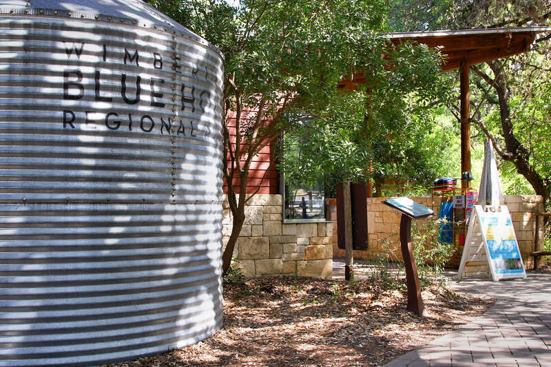 The entrance to the swimming area on Cypress Creek at Blue Hole Regional Park in Wimberley, Texas, United States.