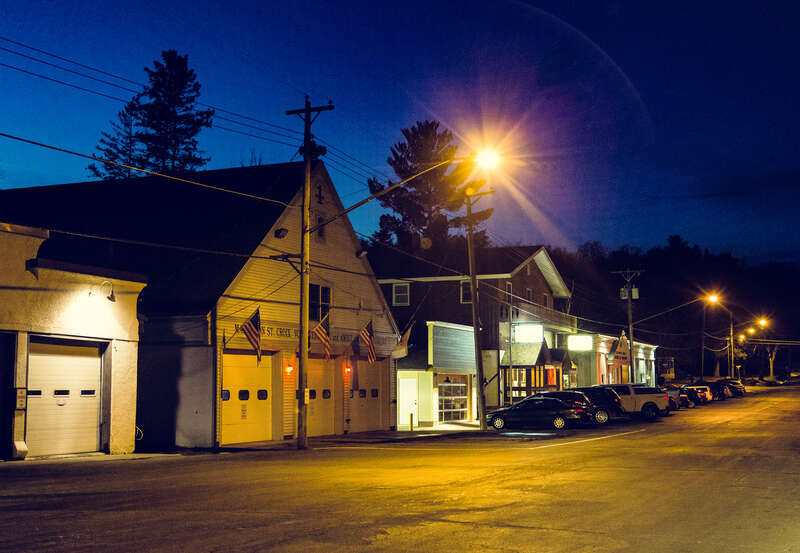 Judd Street and the volunteer fire and ambulance department in the City of Marine on St. Croix, Minnesota, at night.