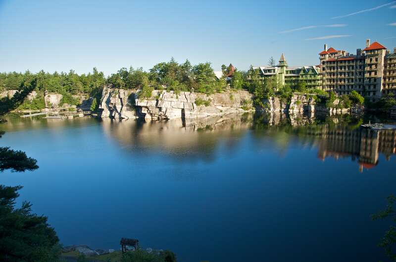 Shawangunk Conglomerate cliff shaped by glacial movement surrounding the Wikipedia:Lake Mohonkat Mohonk Mountain House