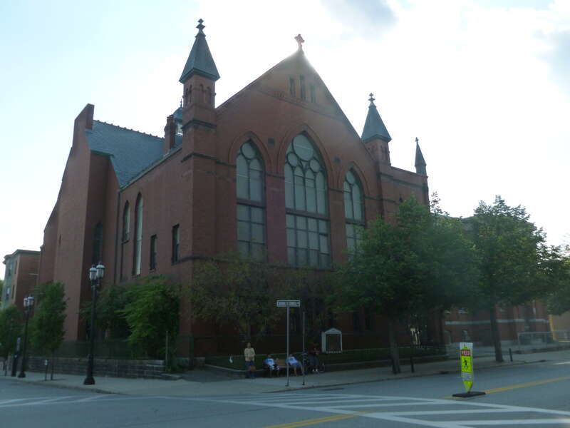 The Smith Baker Center, formerly the First Congregational Church.  Located at 400 Merrimack Street, Lowell, Massachusetts.  East and north (front) sides of building shown.