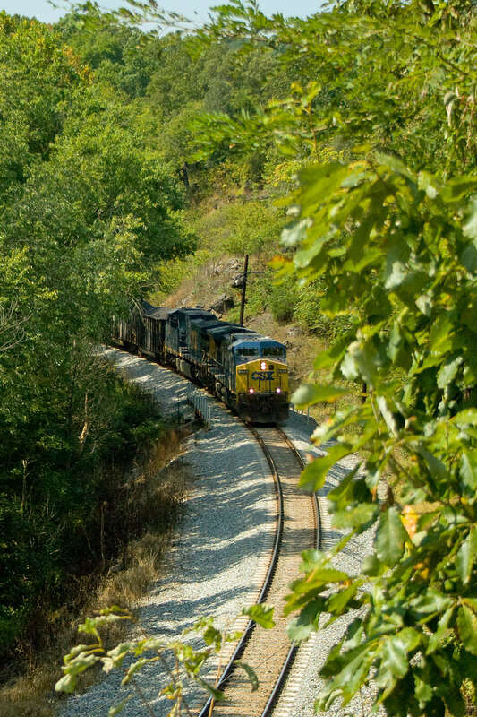 A CSX coal train heads east along the James River Line in Natural Bridge Station, VA.  Two AC4400CW's head up the train.