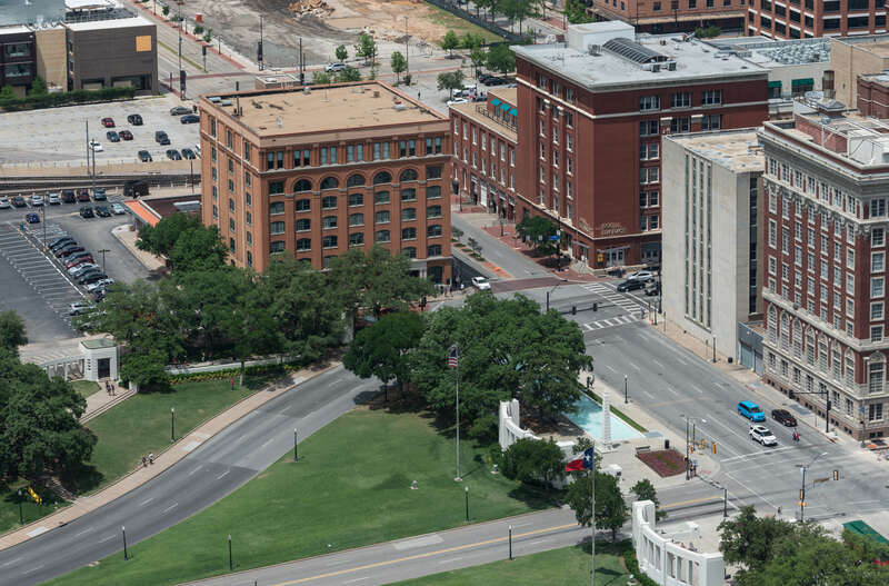 Title: View, in 2014, of Dealey Plaza and the Texas School Book Depository in Dallas, Texas, where Lee Harvey Oswald, the presumptive assassin of President John F. Kennedy, found a perch above the plaza on Nov. 22, 1963
Physical description: 1