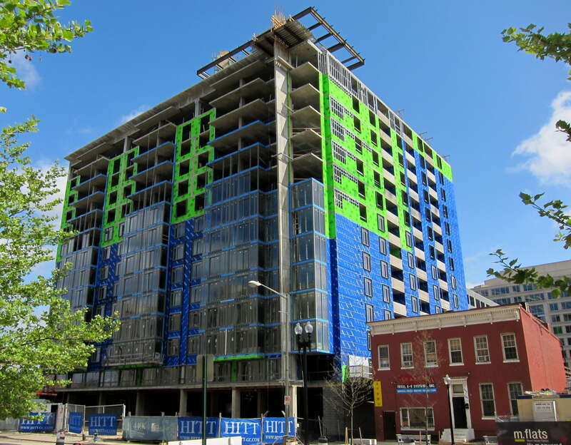 (left) The Lyric 440K apartment building located at 440 K Street NW in the Mount Vernon Triangle neighborhood of Washington, D.C. The postmodern building was designed by the Davis Carter Scott, Ltd. architectural firm. (right) The two Italianate
