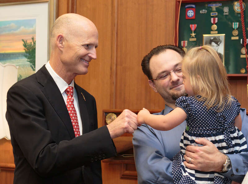 Florida Governor Rick Scott welcomes Down Syndrome Awareness Week 2016 with fist-bumps