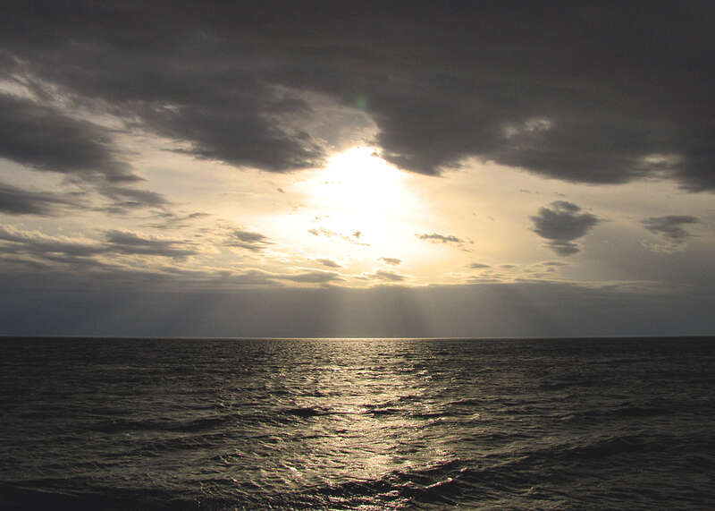 A dramatic sun pokes through the clouds on a rather gloomy looking Easter Sunday and states that the lord has truly risen!