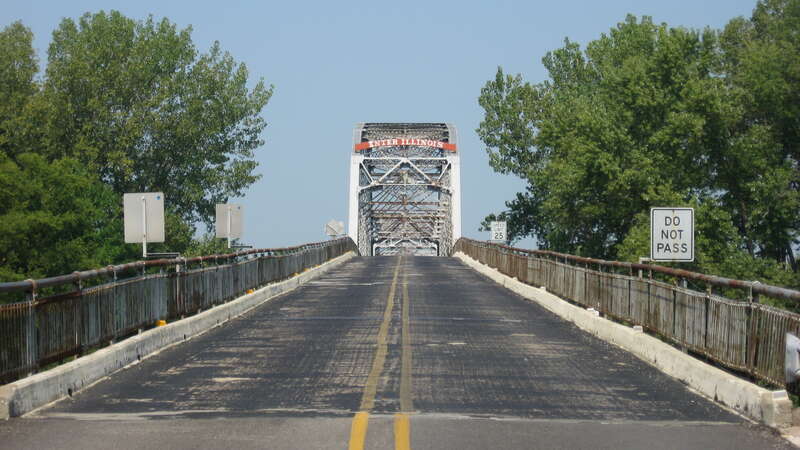 Looking westward from the eastern end of the Harmony Way Bridge, which carries Indiana State Road 66 and Illinois Route 14 over the Wabash River between New Harmony, Indiana and rural White County, Illinois in the United States.  Built in 1930, it is