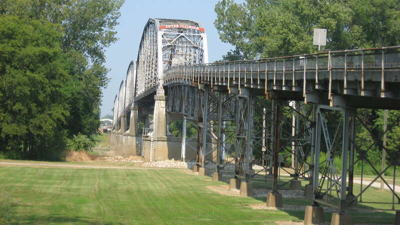 Southern side of the eastern end of the Harmony Way Bridge, which carries Indiana State Road 66 and Illinois Route 14 over the Wabash River between New Harmony, Indiana and rural White County, Illinois in the United States.  Built in 1930, it is