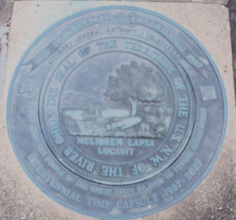 Seal of the Northwest Territory over a time capsule outside the Campus Martius Museum.  Latin phrase “He has planted one better than the one fallen,” signifies the replacement of wilderness by civilization.