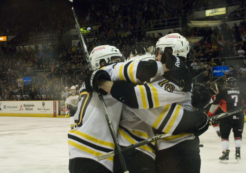 _ERI6264
Providence Bruins celebrate a goal.
Portland Pirates vs Providence Bruins - American Hockey League (AHL)
Providence wins 5-4 in the last Friday game of the season!
Photo taken by Sarah Connors at Providence, Rhode Island on April 8, 2011