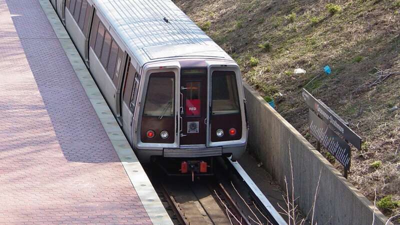 A Red Line train services Grosvenor-Strathmore station, viewed from Tuckerman Lane.

Ben Schumin is a professional photographer who captures the intricacies of daily life.  This image may be used under Creative Commons Attribution-ShareAlike 2.0.