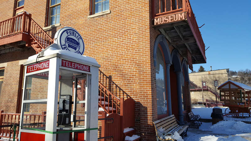 The sole survival telephone booth in the area stands proudly next to the town's museum.