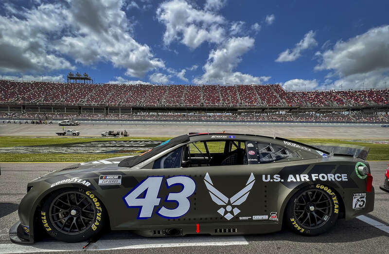 The Air Force-sponsored #43 Petty GMS Chevrolet sits ready to“fly” before the Talladega Superspeedway NASCAR race April 24, 2022 in Alabama.  Tech. Sgt. Andrew Brockman, 96th Maintenance Group, created the Air Force heritage B-29 Superfortress paint