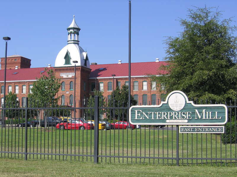 Street-side photo of Enterprise Mill (Augusta, Georgia, USA), former mill converted to loft apartments along Augusta Canal