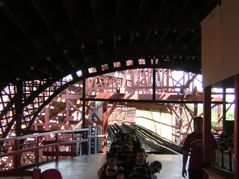 A scene from Kennywood, an amusement park located in West Mifflin, Pennsylvania on the Monongahela River.
This is a view of the Racer, a wooden roller coaster. It is a racing,  moebius loop coaster; one of only three in the world. The current Racer