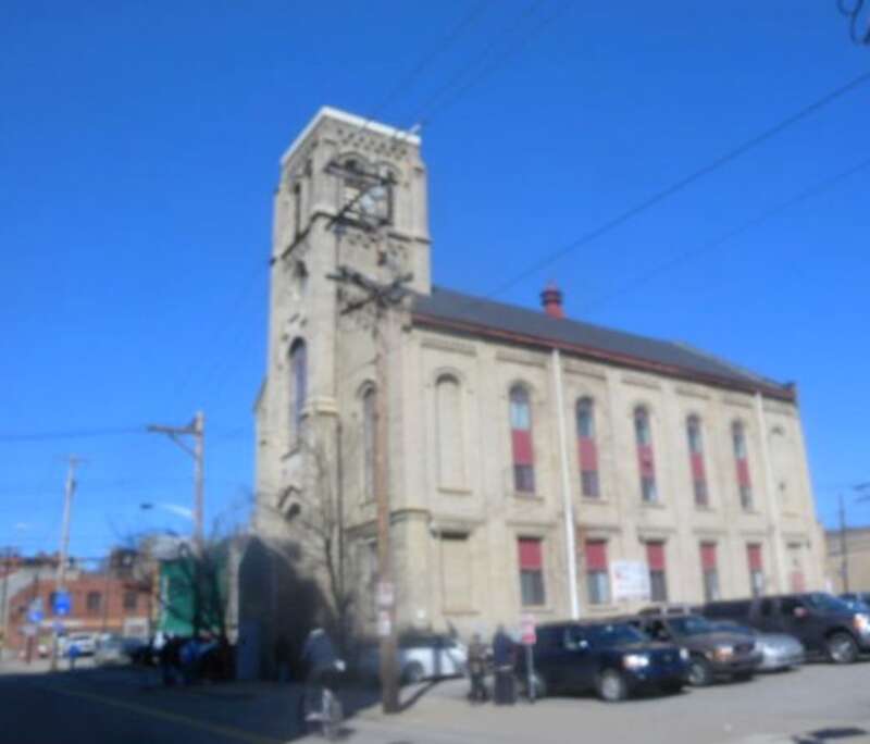 Lookng north from Forbes Avenue across Pride Street at Shepherds Heart Anglican Church, formerly a German Lutheran church, on a sunny early afternoon.