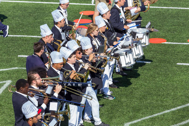 Yale Precision Marching Band wearing chef hats. Yale/Cornell Football game at Yale Bowl, Sept 28, 2019.