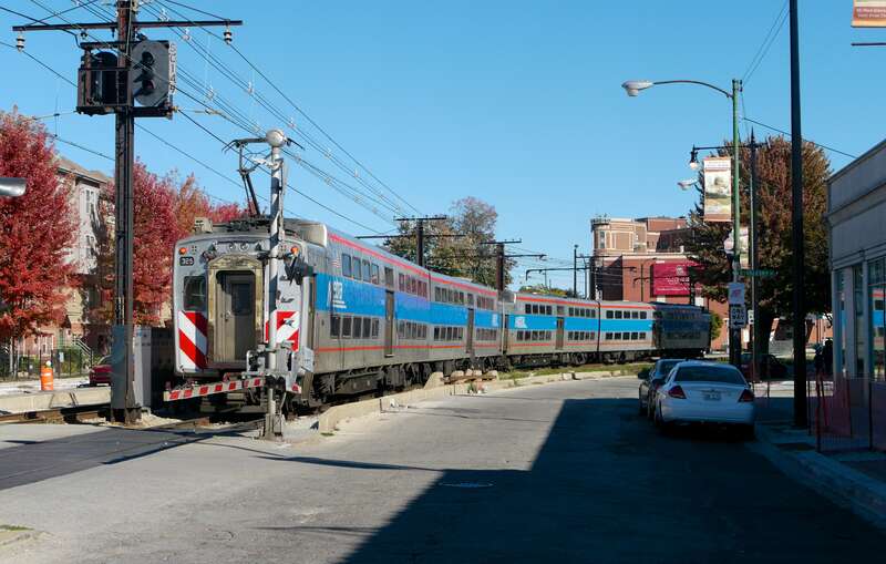 A Metra Electric train running in 71st Street passed our tour many times