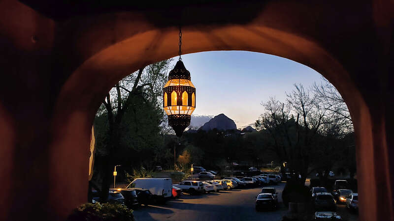 Entry arch of Oak Creek Brewery at sunset in Sedona, Arizona, USA.