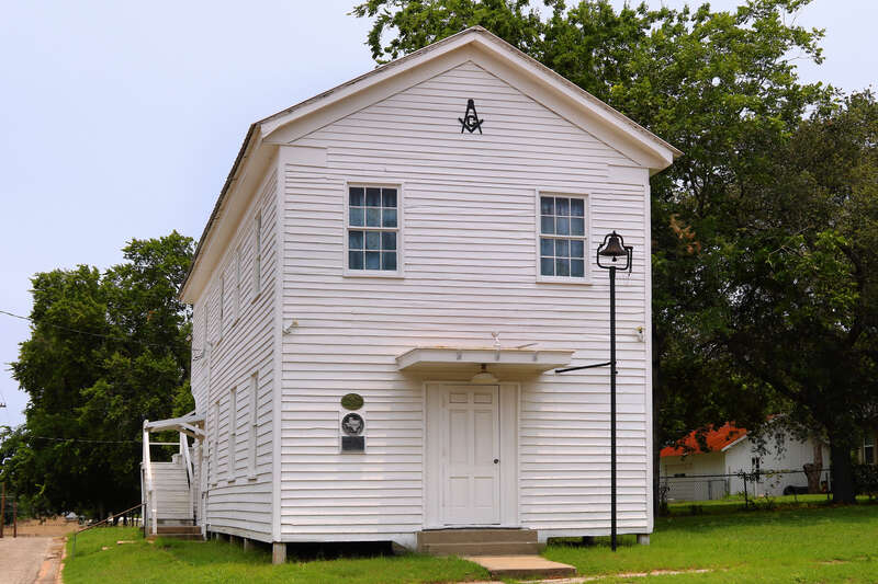 The Masonic lodge building in Shiner, Texas, United States. The building was moved to Shiner in 1889 and used as a Methodist Church and Masonic Lodge until 1914, when the church relocated. The building was designated a Recorded Texas Historic