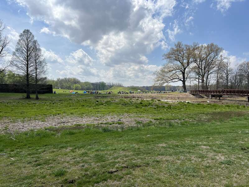 Mound A as seen from the Angel Mounds State Historic Site visitor center across the channel. Note the people in the background gathered to watch the Total Solar Eclipse of April 8, 2024.