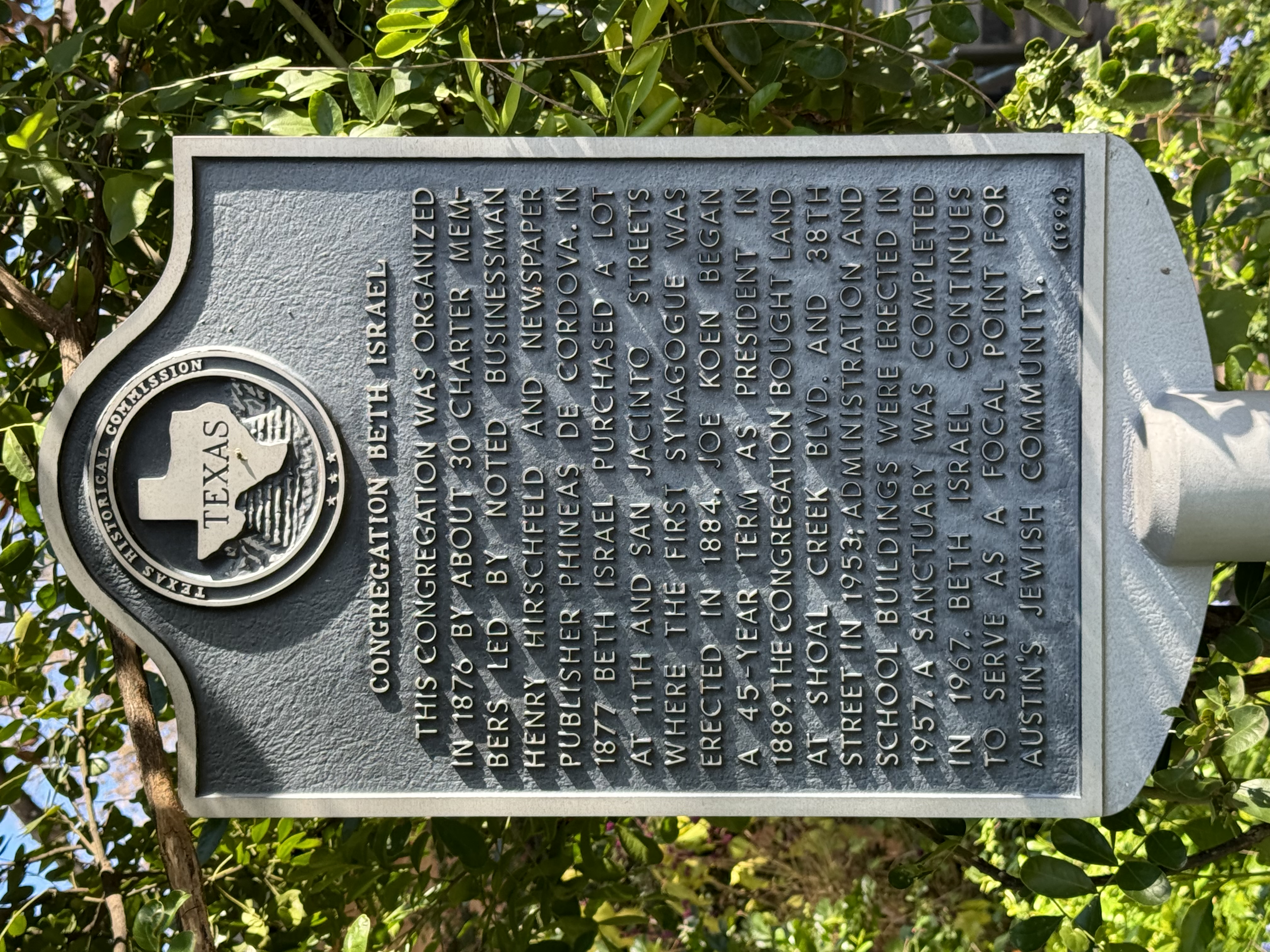 The THC marker for Austin Synagogue Congregation Beth Israel. It reads: “THIS CONGREGATION WAS ORGANIZED IN 1876 BY ABOUT 30 CHARTER MEMBERS LED BY NOTED BUSINESSMAN HENRY HIRSCHFELD AND NEWSPAPER PUBLISHER PHINEAS DE CORDOVA. IN
1877 BETH ISRAEL