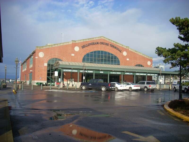 Bellingham Cruise Terminal in Bellingham, Washington.  Signage in front indicates the different lines and voyages that leave from there.