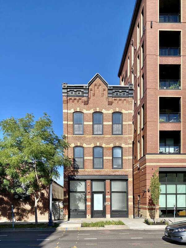 Built in 1884, this Italianate-style building was formerly known as the Chicago House Hotel, a boarding house.  The building features brick pilasters, a decorative stamped metal cornice, arched window openings with decorative stone and brick