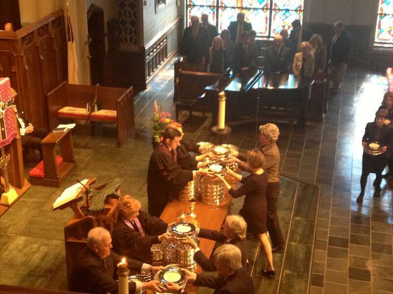 Couldn't resist pulling out my iPhone camera to snap this shot during communion at church recently.  The light and atmosphere were so warm and pleasant.