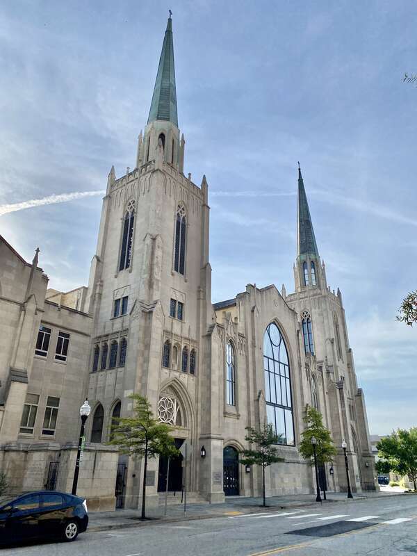 Built in 1926, this Gothic Revival-style building was constructed for the congregation of the First Presbyterian Church of Tulsa, founded in 1885.  The building features a limestone-clad exterior, gothic arched bays, stained glass windows, two towers