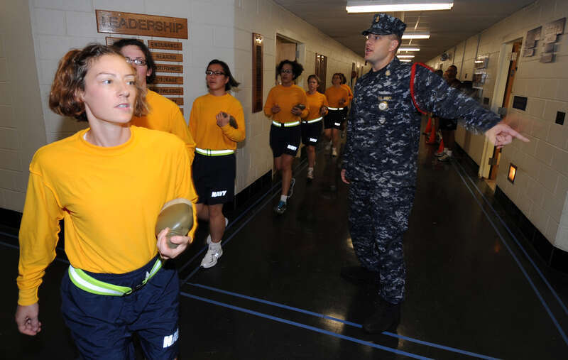 NEWPORT, R.I. (Oct. 23, 2010) Senior Chief Quartermaster Eric Bachtel, a recruit division commander at Officer Candidate School, directs a group of new officer candidates during their first week of the 12-week school at Officer Training Command at