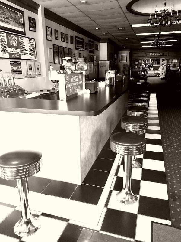A view of Railroad Drug in Midway, Kentucky, featuring the soda fountain.