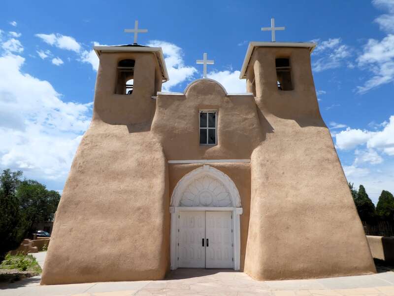 The San Francisco de Asis Church is in Ranchos de Taos, New Mexico.
The church was built between 1772 and 1816 from adobe.
The adobe church is one of the most photographed and painted churches in the world.

It is an active church.