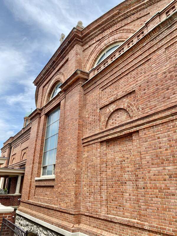 Built in 1905, this Spanish Baroque Revival-style church was designed by Rafael Gustavino and Richard Sharp Smith to serve as the St. Lawrence Roman Catholic Church, serving catholics in the city of Asheville.  The building features a red flemish