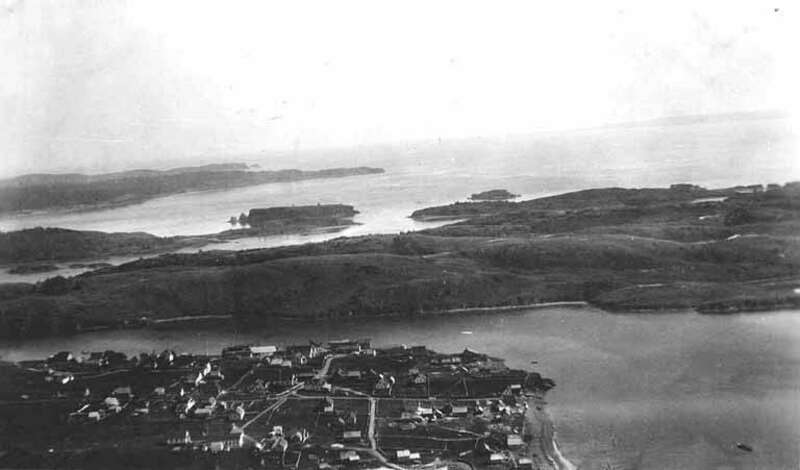 On verso of image: Kodiak, Ak, August 1919
Filed in Alaska--Islands--Kodiak
In 1784 Grigory Ivanovich Shelikhov founded a Russian settlement on Kodiak Island at Three Saints Bay, near the present-day village of Old Harbor. As a means of restricting