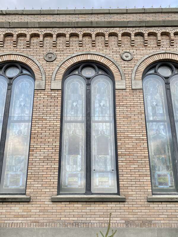 Built in 1921, this stripped and stark Romanesque Revival-style church, home to a Presbyterian congregation, stands at the corner of Central Avenue and 3rd Street in downtown Whitefish, Montana.