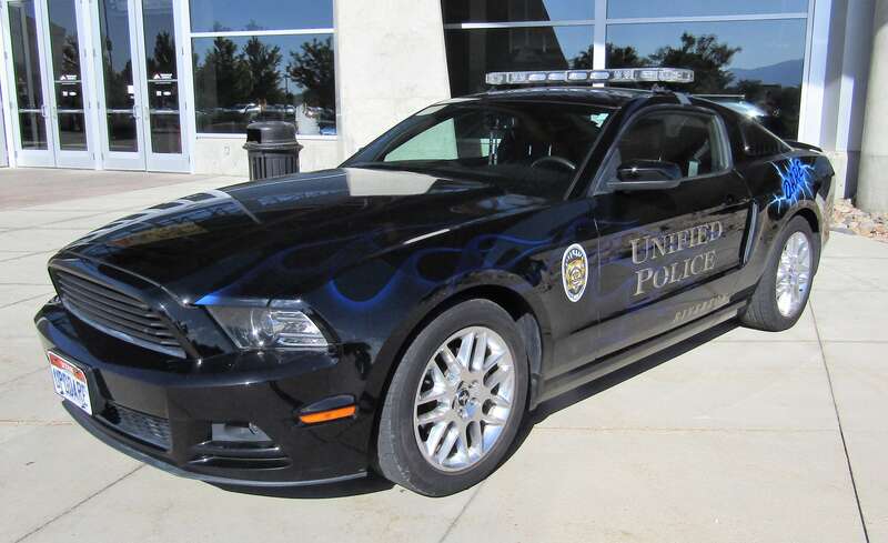 Police car outside the South Towne Exposition Center.